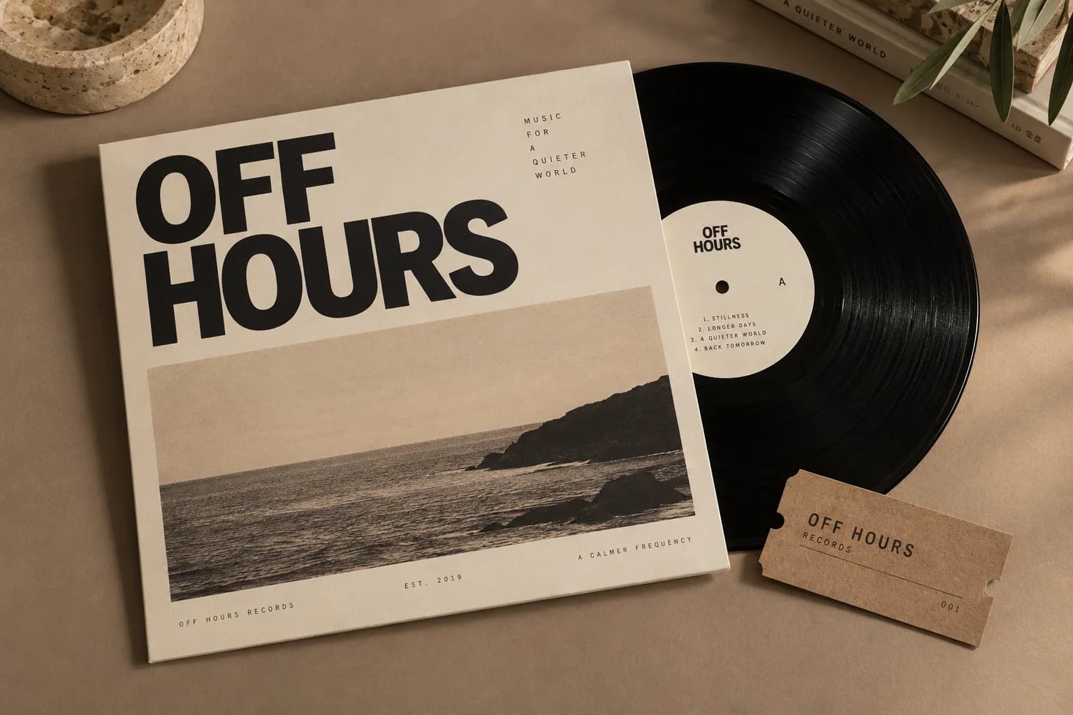 Record, sleeve and tickets on stone